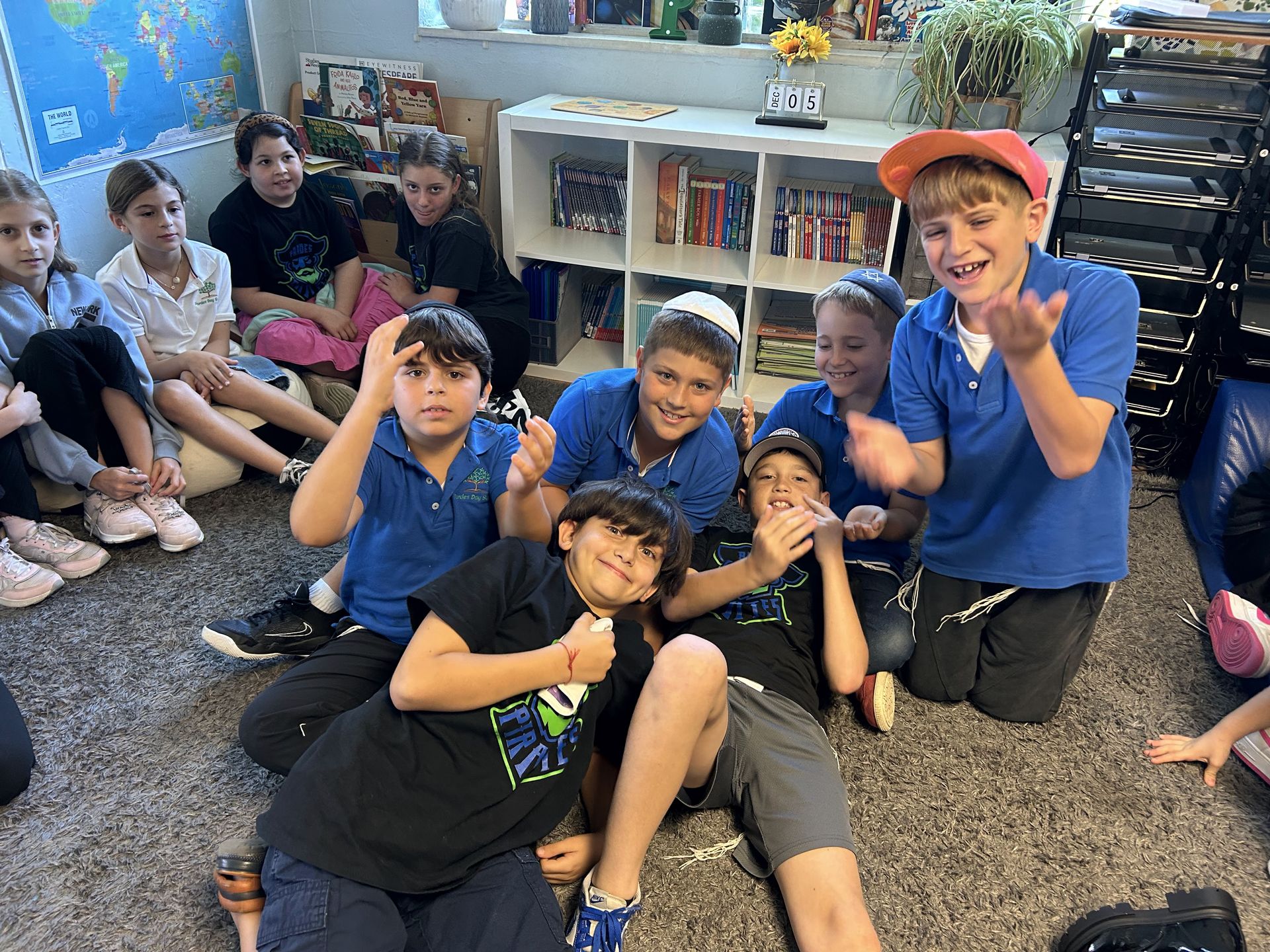 Older students together on the classroom rug