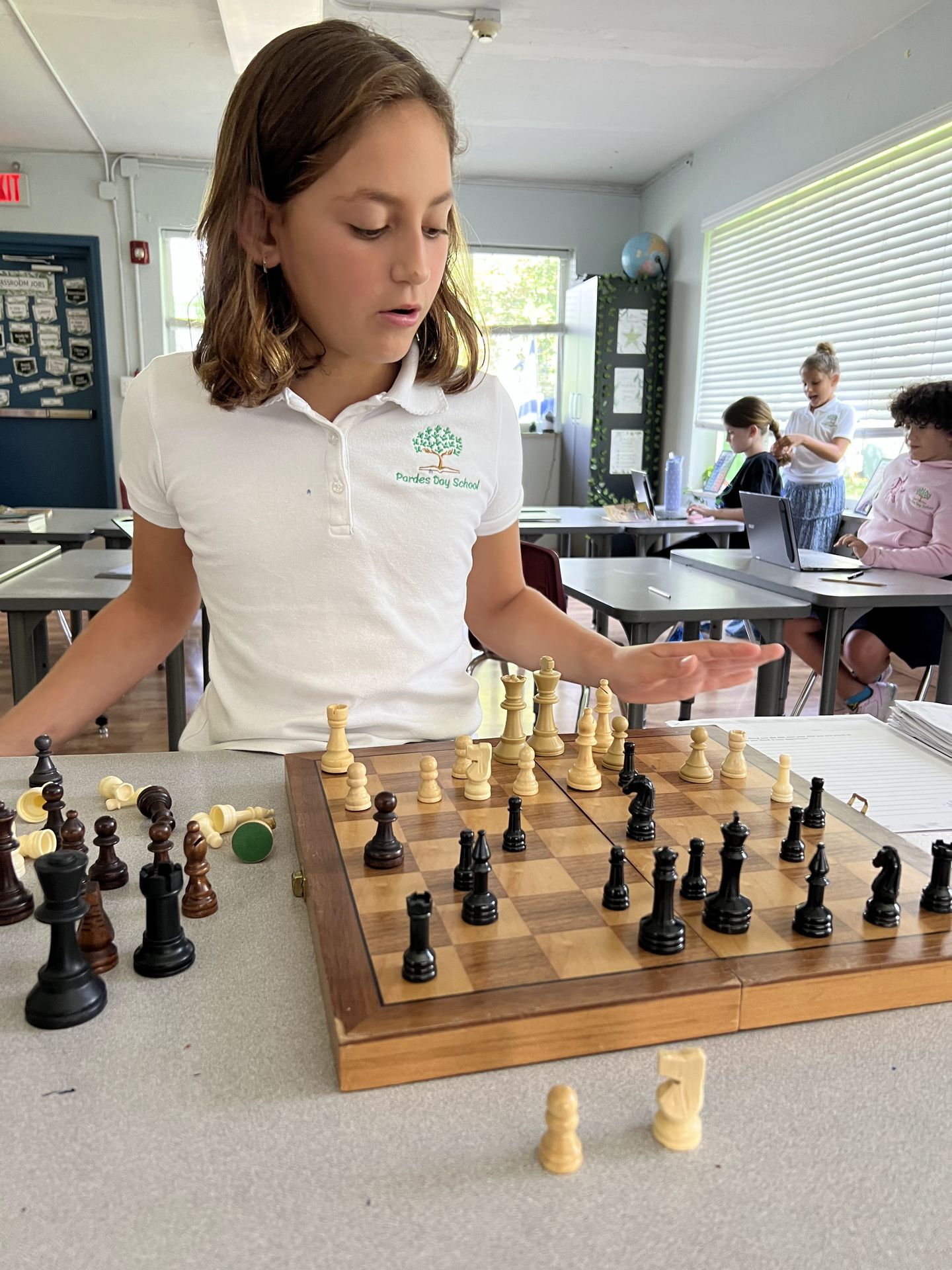 A student playing chess