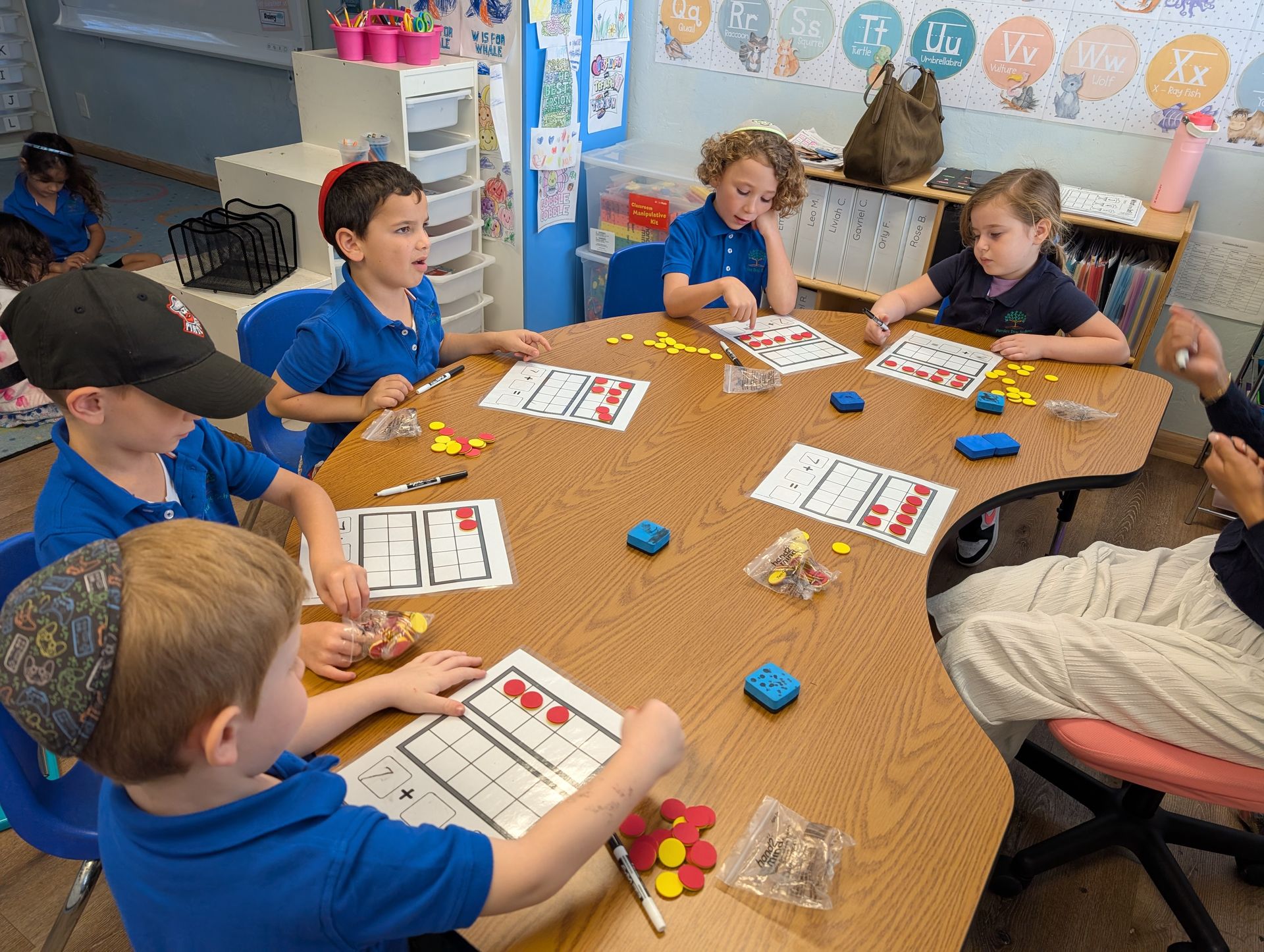 Young students counting with ten frames