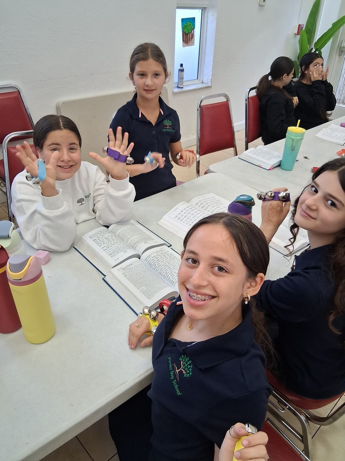 Students learning with energy during Judaic studies